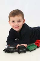 08-Kenny_playing_with_his_train