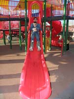 04-Kenny_and_Daddy_coming_down_a_slide_together