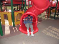 05-Kenny_and_Daddy_coming_down_another_slide_together