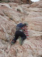 07-Kenny_scrambles_up_the_rock