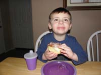 01-Kenny_gets_to_eat_a_glazed_cinnamon_roll-he_really_liked_it