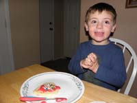 05-Kenny_really_liked_decorating_his_cookie-he_loved_eating_it_too