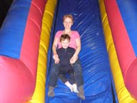 31-Mommy_and_Kenny_coming_down_the_slide