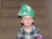 01-Kenny_and_his_dinosaur_hat_he_made_at_school
