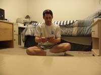 14-Kenny_takes_a_picture_of_Daddy_playing_Go_Fish_with_himself-Kenny_provides_instructions