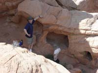 24-Kenny_pees_on_a_bush