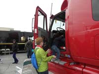 09-Kenny_climbing_into_the_big_rig