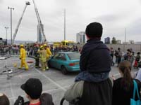24-poised_to_watch_jaws_of_life_demo_by_firemen