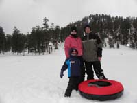 08-family_ready_to_go_sledding-amazing_that_no_one_else_is_up_here