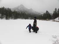 11-are_you_following_my_footprints-The_Sisters_in_the_background-20_degrees_and_snowing