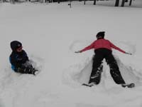24-showing_Kenny_how_to_make_a_snow_angel