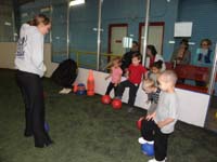 02-learning_to_trap_the_ball_with_foot-friend_Zoe_also_in_class-Darby_and_Mommy_watch