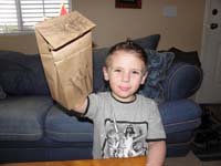 24-Kenny_shows_off_Robin_the_Cheetah_he_made_at_school