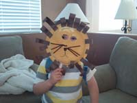 27-lion_mask_made_at_school_over_a_week's_time-he_wanted_to_take_to_Atlanta-gave_to_Grandpa_Duke