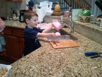 06-Kenny_helps_with_the_dishes