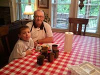 23-Kenny_and_Grandpa_Duke_coloring_Easter_eggs