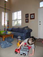07-Kenny_playing-look_at_the_big_Lego_tower_he_and_Daddy_created