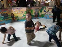 24-Kenny_and_his_friends_digging_for_buried_treasure_at_Kettlemuck's_Toy_Shoppe