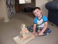 01-Kenny_and_his_castle_made_from_his_wagon_of_blocks