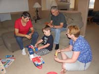 22-Kenny_playing_with_his_aircraft_carrier