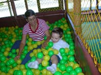 16-Baba_and_Kenny_playing_in_the_ball_pit