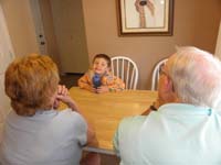 07-Kenny_waits_for_a_slice_of_cake