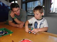 49-Kenny_working-Daddy_watching