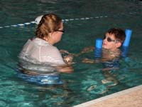 11-Miss_Alex_showing_Kenny_breaststroke_arms