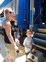 22-Mommy_and_Kenny_boarding_the_train