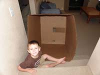 19-Kenny_likes_playing_with_the_box-and_with_Daddy