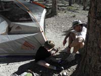 01-Kenny_helps_Daddy_with_the_tent_stakes
