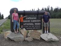 05-Mommy_Kenny_and_Daddy_at_the_Grand_Canyon_North_Rim_NP_entrance_sign