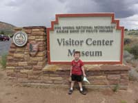 15-Kenny_with_certificate_and_badge_at_Pipe_Spring_sign-he_needs_a_nap