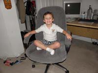 36-Kenny_wanted_Daddy_to_take_a_picture_of_him_sitting_in_Daddy's_chair