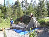 04-Kenny_helping_Mommy_pitch_tent_in_Grand_Tetons_National_Park