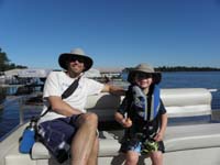 40-Daddy_and_Kenny_with_apple_we_picked_from_tree_at_the_cabin-they_tasted_really_good