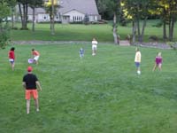 65-playing_kickball_with_the_neighbors