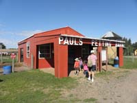 72-Baba_entering_petting_barn_with_kids
