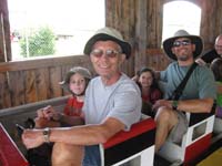 84-Kenny_Poppy_Brooke_and_Daddy_ride_the_train