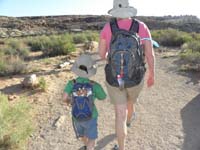 12-Kenny_wanted_to_take_baby_giraffe-she_likes_the_ride_in_his_backpack_while_she_wears_'sunglasses'
