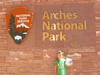66-Kenny_shows_off_his_Junior_Ranger_badge_at_the_visitor_center