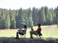 21-Toby_and_Joel_relaxing_with_a_book