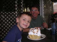 13-after_getting_flat_tire_repaired_we_ate-very_good-Kenny_and_Daddy_share_mexican_fried_ice_cream