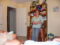 02-Kenny_takes_a_picture_of_Daddy_and_Mommy