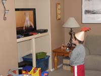 03-Kenny_wanted_to_wear_his_Phineas_hat_while_watching_Toy_Story