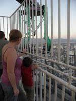 27-Kenny_and_Mommy_watch_people_on_the_Insanity