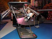 31-fun_at_Circus_Circus_Adventure_Dome-riding_a_plane