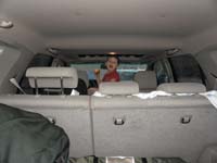 059-Kenny_would_rather_hang-out_in_the_vehicle_eating_an_apple