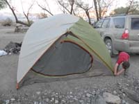 109-Kenny_helped_snap_tent_cover_to_support