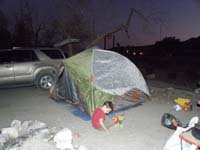 110-Kenny_has_time_to_play_in_dirt_before_taking_free_shower_with_Daddy